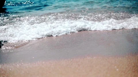 Sea surf on a sandy beach Stock Footage 303554494