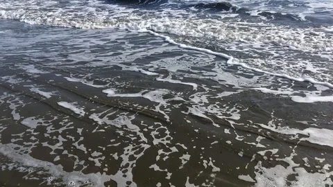 Sea surf on a seacoast close up Stock Footage 125700628
