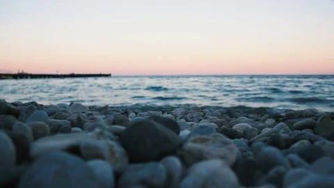 Sea surf on a stony beach Stock Footage 84547399