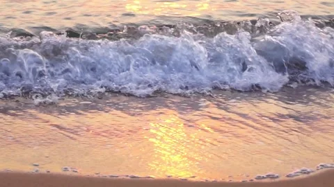 Sea surf with sunset reflection Stock Footage 275142873