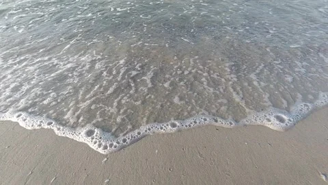 Sea surf. Waves lapping on the sand. Slow motion Stock Footage 258058234