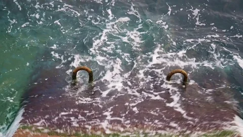 Sea surf waves on the stone shore Vídeo Stock 84745975