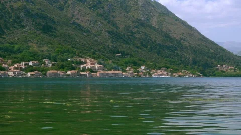 Sea surface and mountains in the background Stock Footage 90311261