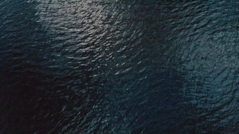 Sea Surface Background With Ripple And Reflection Of Sunlight From Above. Video stock 112750137
