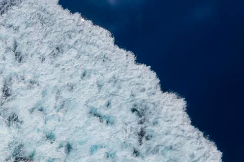 Sea surface background with splashing waves. Top view. Fotos Stock