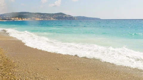 Sea surface close up shot with waves, blue sky with small clouds. 4k UHD 2160p Stock Footage 112951808
