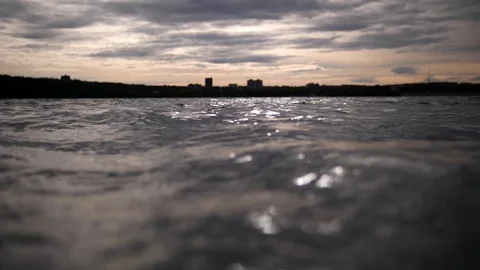 Sea surface in the evening with warm sunshine slow Stock Footage 96739202