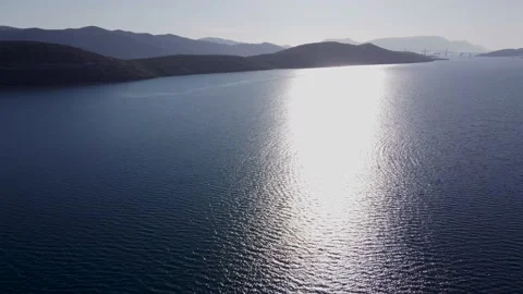 Sea surface with reflections of sun. Aerial drone view of Adriatic sea Stock Footage 153108113