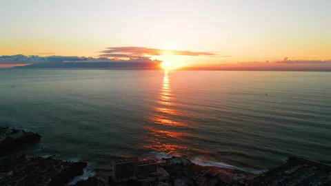 Sea surface small waves against of golden orange sunrise. Large disk of sun Stock Footage 221131485