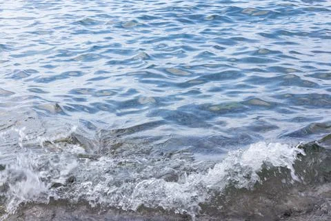 Sea surface with small waves, in blue and turquoise color tones Stock Photos