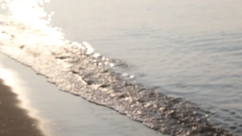 Sea surface sparkling beach,abstract blurry background at the seaside  Stock Footage 106204119