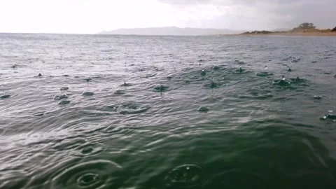 Sea Surface Under Heavy Rain and Incoming Storm Clouds Видео 331153966