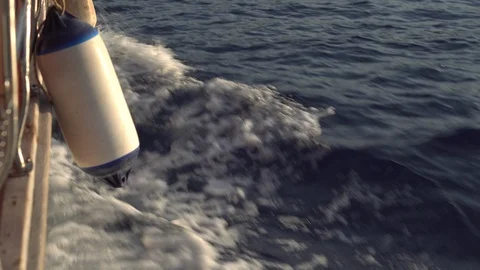 Sea surface of the water, view from a moving boat. The boat sails on the Stock Footage 97174074