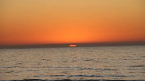The sea swallows the sun Stock Footage 123201624