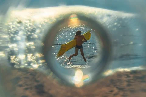 Sea through a plastic bottle. Stock Photos