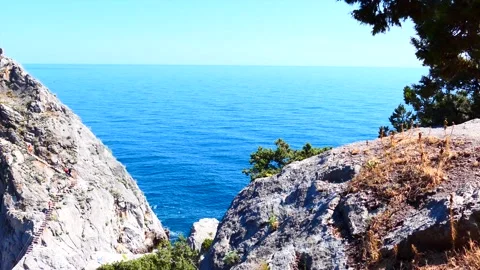 Sea through the rocks Stock Footage 131880810