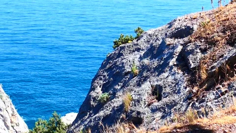 Sea through the rocks Stock Footage 131880811