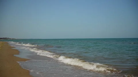 Sea tide, coast, side view Stockbeeldmateriaal 312870977