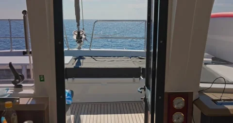 Sea view from the cabin of a moving catamaran, no people, soft mattresses, saili Stock Footage 341269148