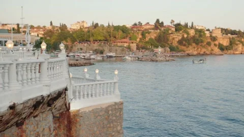 Sea view from the cliff at sunset time. Lanterns are burning Stock Footage 200478029