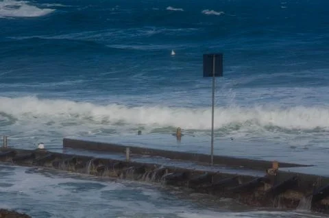 Sea View with Coastal Infrastructure dramatic weather in winter Stock Photos