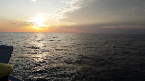 Sea view from deck of a ship at sunset 库存影片 138455793