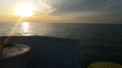 Sea view from deck of a ship at sunset Vídeo Stock 138455816