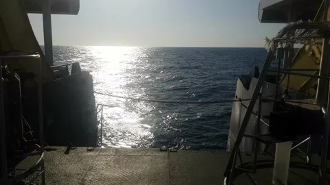 Sea view from deck of a ship at sunset Stock Footage 138595190
