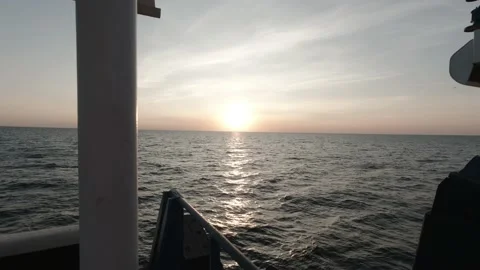 Sea view from deck of a ship at sunset 動画素材 150507020