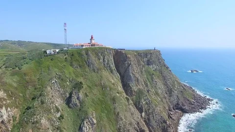 Sea view of lighthouse at Cabo da Roca cape, westernmost extent of mainland Stock Footage 77528520