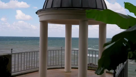 Sea View Looking Through Columns of White Rotunda 動画素材 347978987