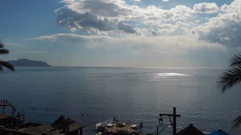 Sea view on the nice summer day blue sky with small clouds, clean blue sea wate Stock Footage 105686302