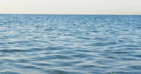Sea view on the Nice summer day with clear horizon. Blue sea surface close up Stock Footage 112795186
