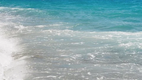 Sea view on the Nice summer day. Sea surface close up shot, blue sky with small Stock Footage 112932570