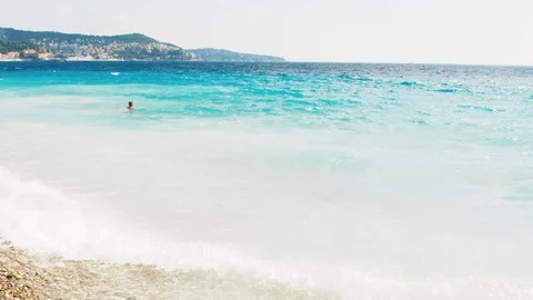 Sea view on the Nice summer day. Sea surface close up shot with waves, blue sky Stock Footage 112945848
