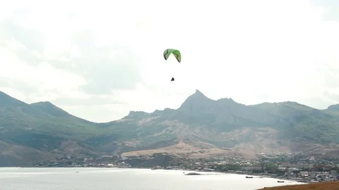 Sea view with paraglider Stock Footage 84549189