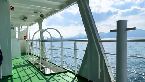 Sea view from passenger ferry ship sailing in ocean with island landscape Stock Footage 154190153