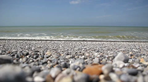 Sea view on pebbles beach Stock Footage 50050499