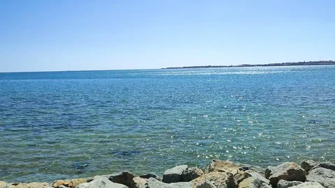 Sea view from the rocky beach 스톡 동영상 282603959