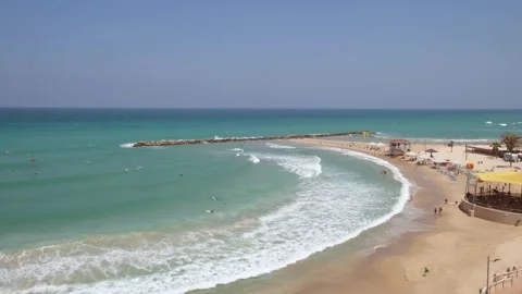 Sea view with sandy beach and people 08.09.2023 - Netaniya, Israel Stock Footage 252447408
