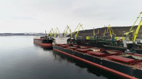Sea view to ship that has finished loading coal and preparing to sail avay from Stock Footage 203920312