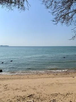 Sea view on a small scale beach 写真素材