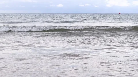 Sea view with small waves in cloudy weather. Balearic Sea Stock Footage 287326807