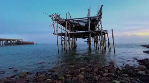 Sea view with a stone beach at sunset. Landscapes Stock Footage 193077794