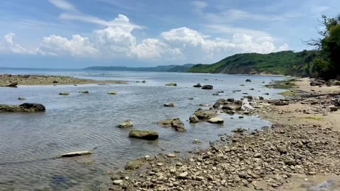 Sea view. Stony coast. Complete calm. Stock Footage 246979330