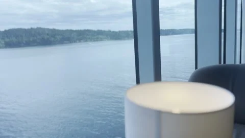 Sea View Through Ferry Window with Blurred Lamp in Foreground Stock Footage 340106432