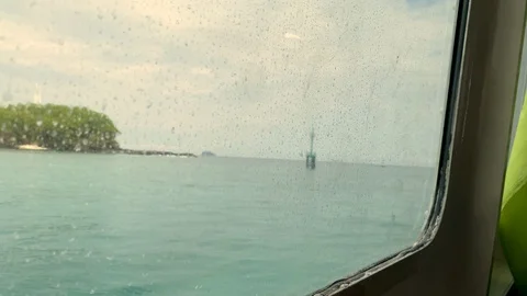 Sea view from the window of fast boat heading towards Gili Trawangan Island, Stock Footage 125842497