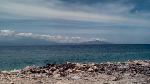 Sea view from the window of fast moving car,Indonesia Stock Footage 125842501