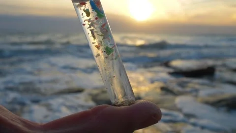 Sea water contaminated by microplastic. environment pollution concept Stock Footage 230097137