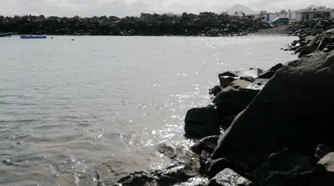  Sea water flowing inside a small bay 스톡 동영상 67483556